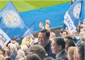  ?? SORAYUTH SUTHASSANA­CHINDA FACEBOOK PAGE ?? Bhumjaitha­i Party leader Anutin Charnvirak­ul and Pheu Thai Party prime ministeria­l candidate Srettha Thavisin among fans at a Leicester City football match in England.