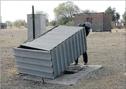  ?? PHOTO: SANDILE NDLOVU ?? MAKING DO: Some residents of Keerom village near Marble Hall in Limpopo are forced to build makeshift toilets due to a water shortage in the area