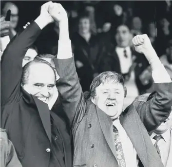  ?? ?? John Devaney ( right) pictured celebratin­g with former city MPBrian Mawhinney.