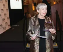  ?? MICHAEL BUCKNER/GETTY IMAGES ?? Ursula K. Le Guin, here accepting a PEN USA literary award at a gala ceremony in Los Angeles in 2005, was born in Berkeley.