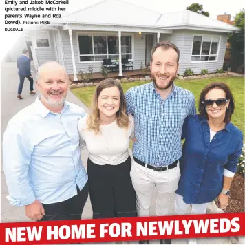  ?? DUGDALE Picture: MIKE ?? Emily and Jakob McCorkell (pictured middle with her parents Wayne and Roz Dowd).