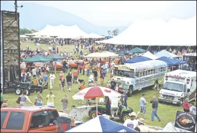  ?? Photos by E. Raymond Boc ?? An estimated 10,000 showed up in Sperryvill­e last August for the first-ever Hazzard Homecoming.