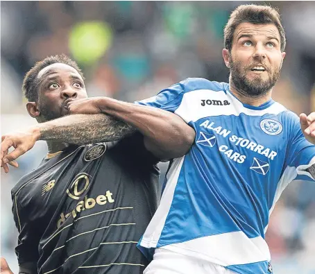  ?? Picture: PPA. ?? Richard Forster goes up against Celtic’s Moussa Dembele on his St Johnstone debut last week.