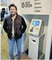  ??  ?? > Simon Miles, from Merthyr Tydfil, with his ATM machine. A former railway worker, Simon invested £12,000 to buy the machine and start his bitcoin brokering company Misoneism Limited