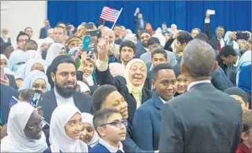  ?? Pablo Martinez Monsivais Associated Press ?? PRESIDENT OBAMA visits the sprawling Islamic Society of Baltimore, where he called for an end to invective that confuses millions of patriotic Americans with a “radical, tiny minority” who engage in violence.