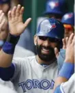  ?? COLIN E. BRALEY/THE ASSOCIATED PRESS ?? Jose Bautista hit a game-tying homer in the fifth and drew a bases-loaded walk in the sixth.