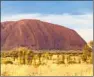  ?? Masci Giuseppe AGF / Universal Images ?? CLIMBERS HAVE worn a pathlike scar into Uluru.