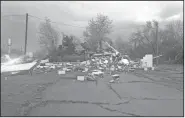  ?? NWA Democrat-Gazette/SALLY CARROLL ?? The Goodman Car Wash was demolished Tuesday night after a suspected tornado ripped through the southeaste­rn part of the McDonald County, Mo., town.