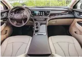  ??  ?? Above: Being Buick’s finest four-door, you’d expect a heavy equipment load, as well as a spacious interior, which the 2018 Buick Lacrosse has in spades. Below: The new Lacrosse comes with a head-up display, heated steering wheel, 4G LTE onboard Wi-Fi,...