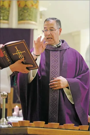  ?? Luis Sánchez Saturno/New file photo Mexican ?? The Rev. Adam Lee Ortega y Ortiz celebrates Ash Wednesday Mass in 2017 at the Cathedral Basilica of St. Francis of Assisi. The priest on Sunday apologized for his monthslong absence and said he was stepping down, spurred by “personal challenges … some of which have been particular­ly difficult for me.”