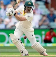  ?? Reuters ?? Australia’s Travis Head plays a shot on day two of the first Test against India. —