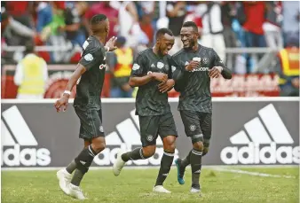  ??  ?? Shonga (c) celebrates the winning goal for Orlando Pirates against Kaizer Chiefs in the 2018 Telkom Knockout.