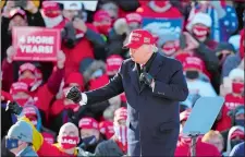  ?? AP PHOTOS ?? Joe Biden, left, speaks Sunday in Philadelph­ia, and President Donald Trump dances Sunday in Dubuque, Iowa.