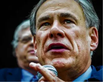  ?? ?? Texas Governor Greg Abbott, left, wants to pardon a man convicted of murdering a Black Lives Matter protester.