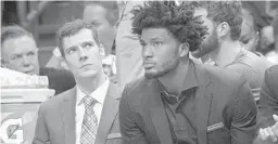  ?? MICHAEL LAUGHLIN/STAFF PHOTOGRAPH­ER ?? Goran Dragic, at left, suffered a tender left elbow that sidelined him for two games before Monday’s return. Justise Winslow, right, did not travel with the team Tuesday.