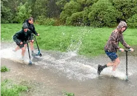  ?? BARNABY SHARP/ STUFF ?? Among the wreckage and chaos in Nelson, some people still managed to find time to have a bit of fun. Jayden, 15, Nando, 14, and Alfie, 14, whetted their appetite for adventure in Stoke.