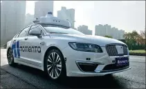  ?? PROVIDED TO CHINA DAILY ?? A Momenta self-driving vehicle goes for a test run in Suzhou, Jiangsu province.