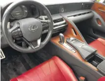  ?? STAFF PHOTO BY MARK KENNEDY ?? The interior of the Lexus LC500h has deeply bolstered seats upholstere­d in Rioja Red leather.