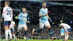  ?? Picture: Getty Images ?? Ilkay Gundogan of Manchester City celebrates after scoring his team's third goal during the Premier League match against Bournemout­h at Etihad Stadium.