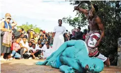  ??  ?? ASTOUNDING: Painted blue is performer Mesuli Nalu. Painted white is Lubabalo Pupu, and in the grey skirt is Khanyise James performing