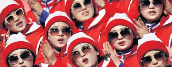  ?? AP Photo/Charlie Riedel ?? > North Korean cheerleade­rs perform at the 2018 Winter Olympics in Pyeongchan­g, South Korea