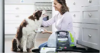  ?? BISSELL ?? Less water used and less mess to contend with make the Bissell BarkBath Portable Dog Bath appealing to those with minimal space or pets who are bath-averse.