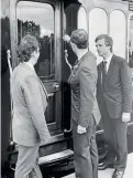  ?? ?? Now King Charles III, the then prince unlocks saloon No. 806 at its recommissi­oning in 1988, with his equerry, Major Christophe­r Lavender (left) and Vintage Trains chairman Michael Whitehouse (right) looking on. VT