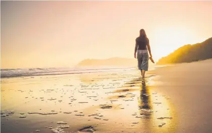  ?? Photos / Getty Images ?? When performing “walking meditation”, we use the physical, mental and emotional experience­s of walking as the basis for developing greater awareness.