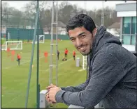  ??  ?? OLD HAUNTS: Suarez watches training yesterday