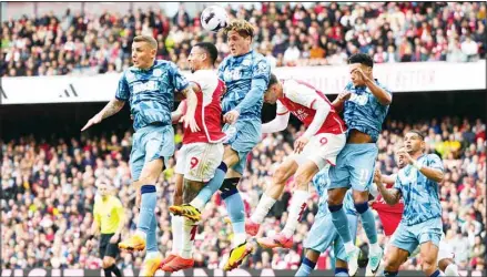  ?? ?? Aston Villa’s Lucas Digne, from left, Arsenal’s Gabriel Jesus, Aston Villa’s Lucas Digne, Arsenal’s Kai Havertz and Aston Villa’s Ollie Watkins go for header during the English Premier League soccer match between Arsenal and Aston Villa at the Emirates stadium in London. Unai Emery damaged his former team’s title hopes again as Aston Villa beat Arsenal 2-0 to leave Manchester City top of the Premier League. Both goals came late after Villa had soaked up Arsenal’s pressure for much of the game, with Leon Bailey putting his team ahead in the 84th and Ollie Watkins adding the second on a counteratt­ack two minutes later. (AP)