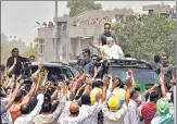  ?? SONU MEHTA/HT ?? ▪ PM Narendra Modi during a road show after inaugurati­ng the DelhiMeeru­t Expressway in east Delhi on Sunday.