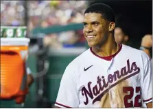  ?? ALEX BRANDON — THE ASSOCIATED PRESS FILE ?? Washington Nationals’ Juan Soto smiles in the dugout after a solo home run during a baseball game against the New York Mets at Nationals Park on Monday in Washington.