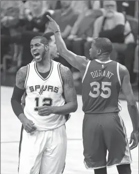  ?? AP/RONALD CORTES ?? Spurs forward LaMarcus Aldridge (12) reacts after missing a shot as Golden State forward Kevin Durant gestures Saturday in San Antonio.