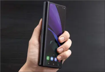  ??  ?? The Galaxy Z Fold2’s outside screen is way larger than the original model.