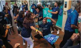  ?? Photo: Leon Lord ?? Fijian Drua fans dancing away at the Bula Bar in Canberra, Australia, on April 14. 2023.