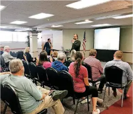  ??  ?? Sam Fredrickso­n, a board member with Our Revolution Oklahoma, speaks during a forum on State Question 788 at the Edmond Community Center on Thursday.