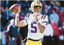  ?? MICHAEL WOODS/AP ?? LSU quarterbac­k Jayden Daniels has powered the Tigers’ offense, accounting for 3,592 yards of total offense in 2022.