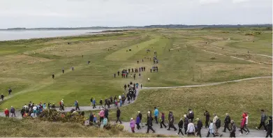  ??  ?? Crowds flocking to the West of Ireland Golf Championsh­ip at Co Sligo Golf Club in Rosses Point last week.