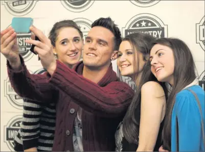  ??  ?? Aisling Moore, Eimear Clancy and Ali Kenny have their photo taken with Gaz from Geordie Shore