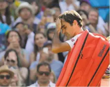  ?? Ben Curtis / Associated Press ?? Federer lost a match at a Grand Slam after holding match point for the fifth time — and first in seven years.