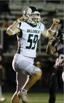  ?? JULIA MALAKIE PHOTS / LOWELL SUN ?? PICK ME UP: Matt McLeod celebrates a Billerica intercepti­on in the first half of the Indians’ 32-14 win over Westford Academy on Friday night.