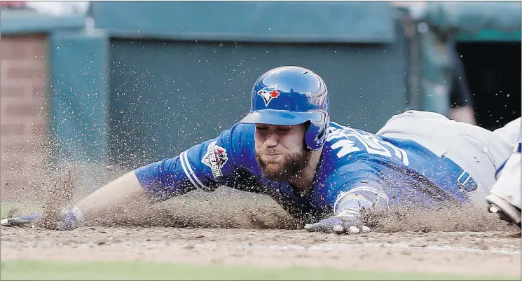  ?? — THE ASSOCIATED PRESS FILES ?? Toronto Blue Jays catcher Russell Martin likes the team’s improved depth, pitching and defence to complement the establishe­d offence this season.