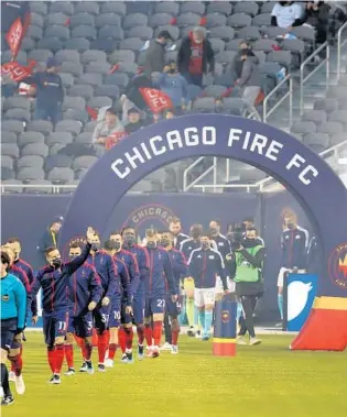  ?? CHRIS SWEDA/CHICAGO TRIBUNE PHOTOS ?? The Chicago Fire are introduced before their season opener against the New England Revolution at Soldier Field in Chicago on Saturday, April 17, 2021.