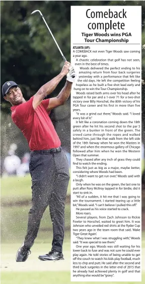  ?? AP ?? Tiger Woods hits from the third fairway during the final round of the Tour Championsh­ip golf tournament in Atlanta yesterday.