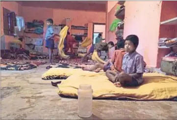  ?? HT PHOTO ?? Children at the primary school for tribal boys from villages affected by Left-wing extremism, at Ghagra village in Gumla district of Jharkhand. At least 21 of the 24 districts in the state are in the grip of Maoist violence.