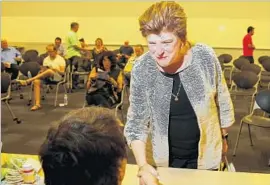  ?? Jay L. Clendenin Los Angeles Times ?? DELAINE EASTIN, who is running for governor, greets people as she arrives to speak at a meeting of the East Area Progressiv­e Democrats in L.A. in June.