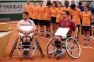  ?? Photograph: Clive Brunskill/Getty Images ?? Alfie Hewett and Gordon Reid are presented with their trophies after the final.