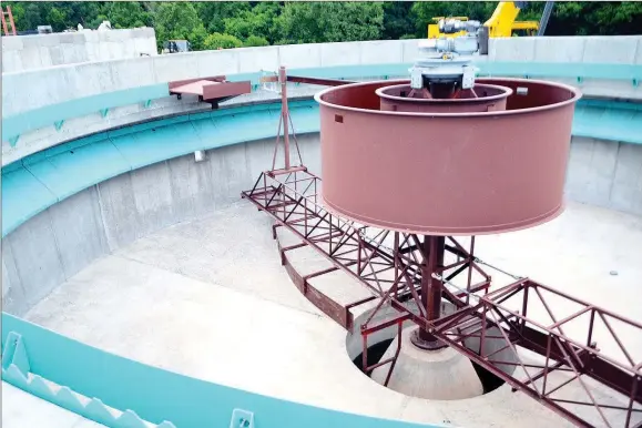  ?? TIMES photograph­s by Annette Beard ?? A clarifier separates sludge in the wastewater.