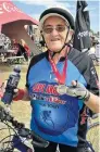  ?? Picture: EUGENE COETZEE ?? SHE DID IT: Val Sandow, 73, shows off her medal after completing the 55km race at The Herald Continenta­l Cycle Tour on Sunday