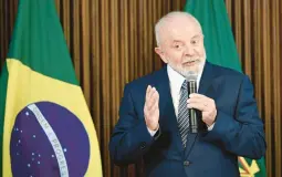  ?? EVARISTO SA/GETTY-AFP ?? President Luiz Inácio Lula da Silva, who is seen Dec. 20, said during a Dec. 12 meeting that “the Brazilian economy will not let anyone down.”